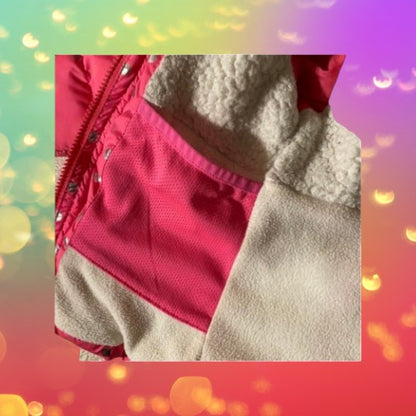 Member’s Mark cozy puffer winter coat features a secure zipper, snap closure and serpa lining