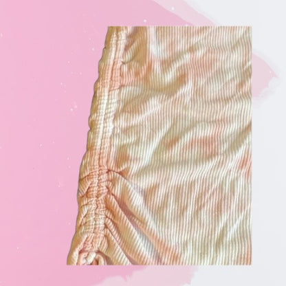 Bring some cheerful flair to your daughter's wardrobe with this Justice Tie Dye Short Sleeve Top