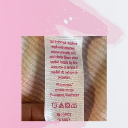 Bring some cheerful flair to your daughter's wardrobe with this Justice Tie Dye Short Sleeve Top