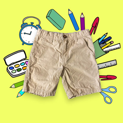 These boy's khaki cotton shorts are both stylish and trendy