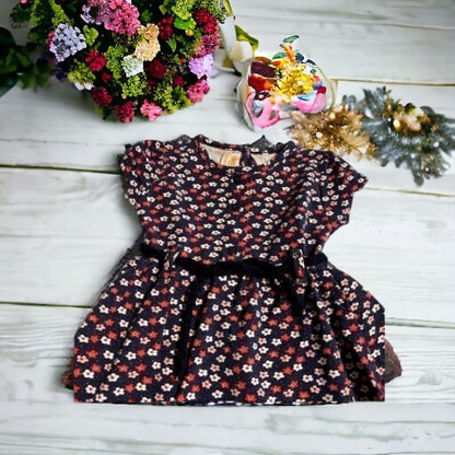 Pretty little girl's beautiful all-over floral dress