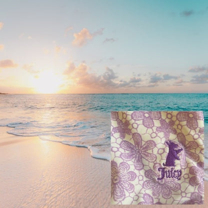 This one-piece bathing suit from Juicy Couture features a darling floral ruffle design