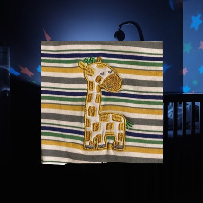 Dress up your baby in style with this high-quality Duck Duck Goose cotton onesie featuring a colorful stripe and cute giraffe appliqué design