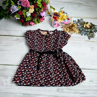 Pretty little girl's beautiful all-over floral dress