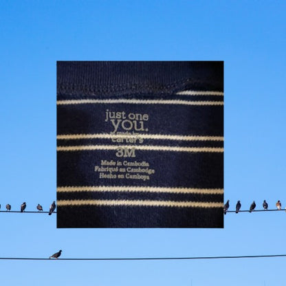 This Carter’s Just One You Little Brother Cotton Footie features a colorful graphics stripe design and convenient full zip closure