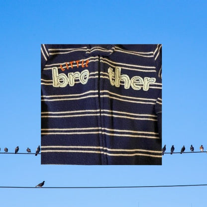 This Carter’s Just One You Little Brother Cotton Footie features a colorful graphics stripe design and convenient full zip closure