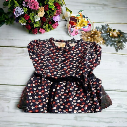 Pretty little girl's beautiful all-over floral dress