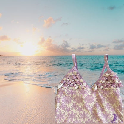 This one-piece bathing suit from Juicy Couture features a darling floral ruffle design