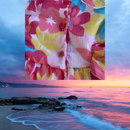 Koala Kids floral ruffle dress boasts a sleeveless, ruffle neckline and convenient pull over design