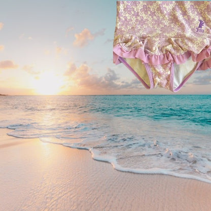 This one-piece bathing suit from Juicy Couture features a darling floral ruffle design