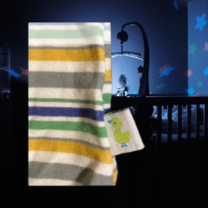 Dress up your baby in style with this high-quality Duck Duck Goose cotton onesie featuring a colorful stripe and cute giraffe appliqué design