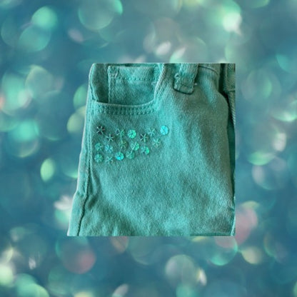 Jean shorts with unique heart-shaped pockets and dazzling sequins