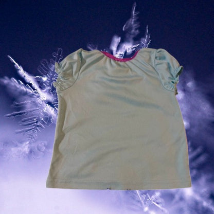 Disney's Elsa and Anna pajama top is perfect for Frozen fans and your little one will love wearing it to bed every night