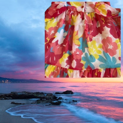 Koala Kids floral ruffle dress boasts a sleeveless, ruffle neckline and convenient pull over design