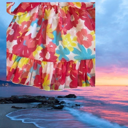 Koala Kids floral ruffle dress boasts a sleeveless, ruffle neckline and convenient pull over design