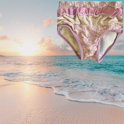 This one-piece bathing suit from Juicy Couture features a darling floral ruffle design