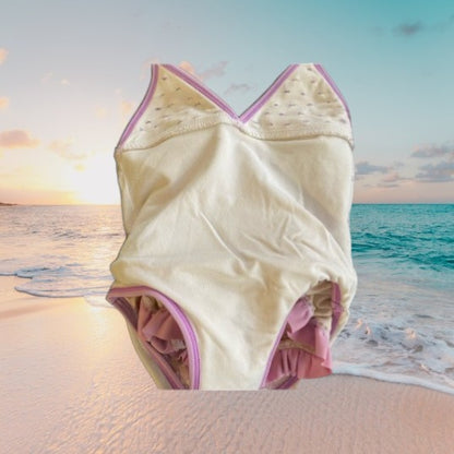 This one-piece bathing suit from Juicy Couture features a darling floral ruffle design