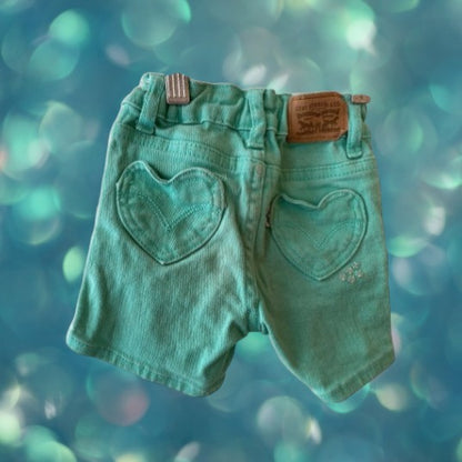 Jean shorts with unique heart-shaped pockets and dazzling sequins