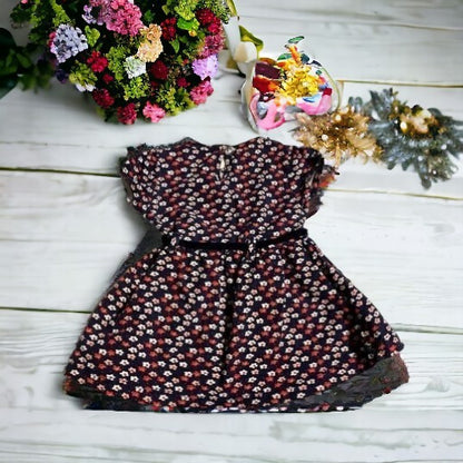 Pretty little girl's beautiful all-over floral dress