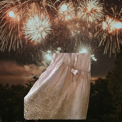 This beautiful Shrinking Violet cotton dress boasts a crocheted design