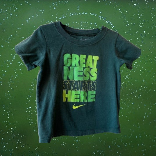 This Nike "Greatness Starts Here" Boy Graphic Tee is designed for active toddlers who are always on the go