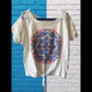 This Justice Girl's Lace Top features a striking blend of colors, enhanced by glitter and rhinestones