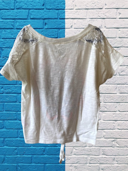 This Justice Girl's Lace Top features a striking blend of colors, enhanced by glitter and rhinestones