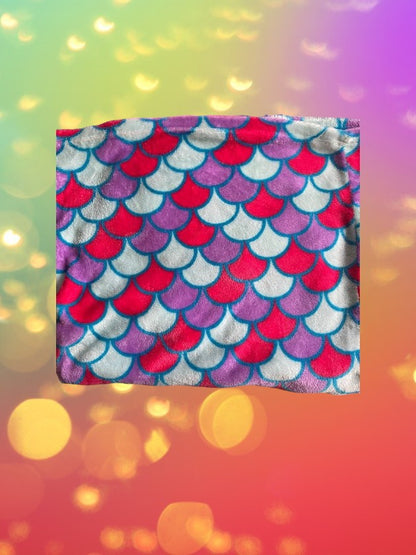 This cozy mermaid design tail blanket has beautiful colors and a fun design