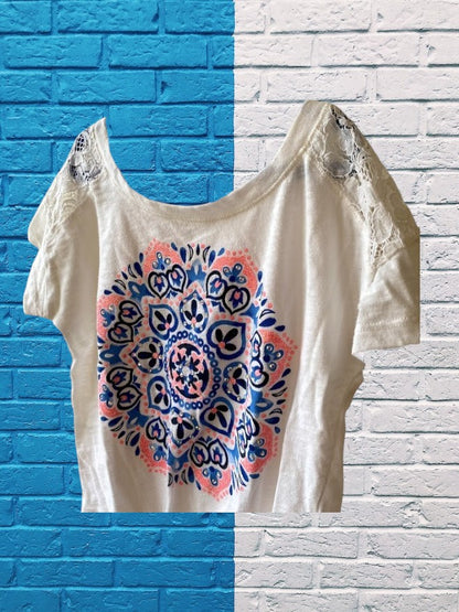 This Justice Girl's Lace Top features a striking blend of colors, enhanced by glitter and rhinestones