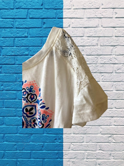 This Justice Girl's Lace Top features a striking blend of colors, enhanced by glitter and rhinestones