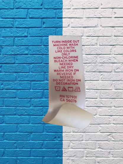 This Justice Girl's Lace Top features a striking blend of colors, enhanced by glitter and rhinestones